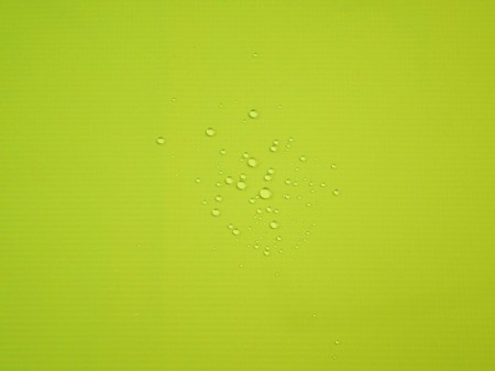マスカットグリーン系　ナイロン　2.5層撥水防水透湿コーティング加工　ミニリップ　裏面:幾何学柄