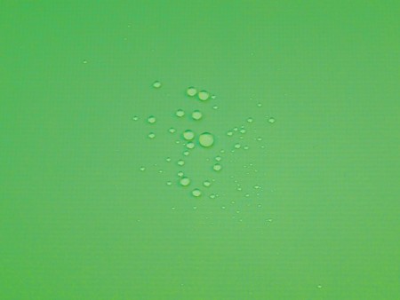 エメラルドグリーン系　ナイロン　2.5層撥水防水透湿コーティング加工　ミニリップ　裏面:幾何学柄