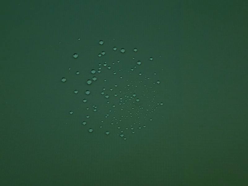 マラードグリーン系　ナイロン　2.5層撥水防水透湿コーティング加工　ミニリップ　裏面:幾何学柄