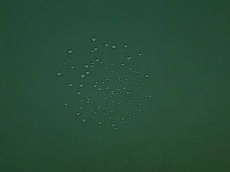 マラードグリーン系　ナイロン　2.5層撥水防水透湿コーティング加工　ミニリップ　裏面:幾何学柄